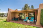 Quaint and quiet back patio to sit with your coffee and enjoy the golf course and mountain view